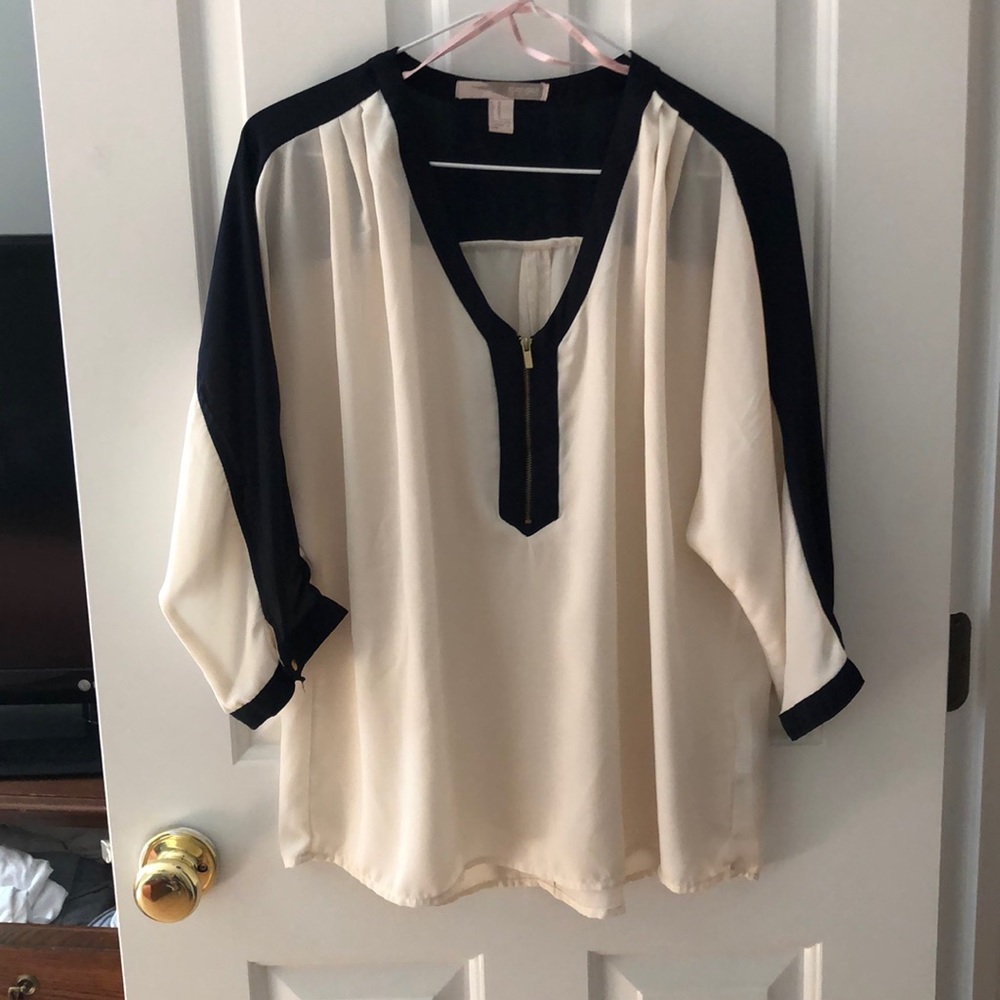 Women’s navy and cream top